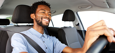 Happy man in the car